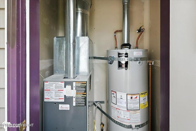 46640 Jo Ave, Kenai, AK 99611 - utility room with secured water heater and heating unit