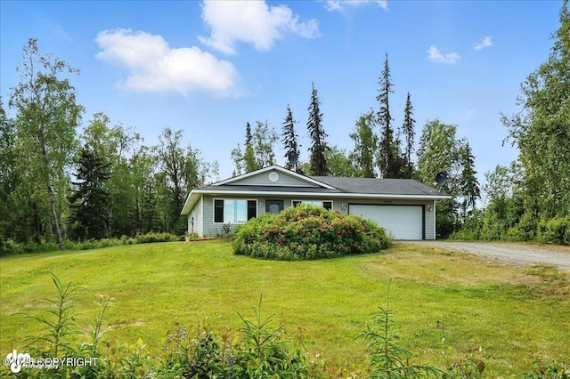 46640 Jo Ave, Kenai, AK 99611 - view of front of house featuring driveway, a garage, and a front lawn