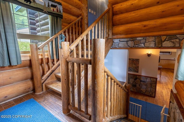 2415 Afognak Ave, Seward, AK 99664 - stairs with log walls and wood finished floors