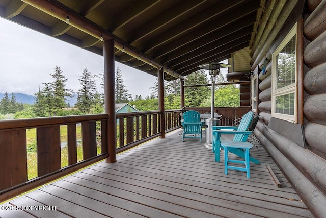 2415 Afognak Ave, Seward, AK 99664 - deck featuring outdoor dining space and grilling area