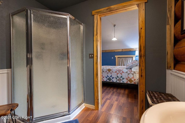 2415 Afognak Ave, Seward, AK 99664 - full bathroom with wood finished floors, a stall shower, and ensuite bath