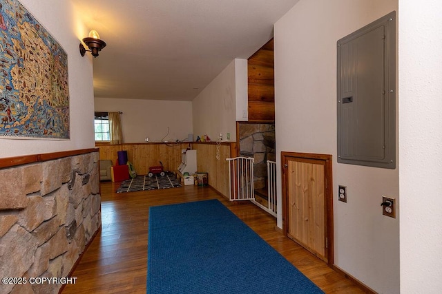 2415 Afognak Ave, Seward, AK 99664 - corridor with electric panel, wood finished floors, and wood walls