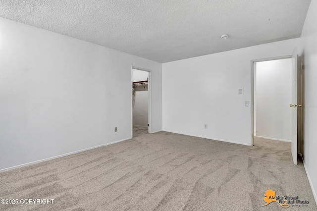 3958 Reka Dr Unit A-2, Anchorage, AK 99508 - empty room with carpet and a textured ceiling