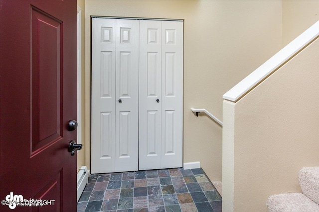 18644 Eaglewood Loop, Eagle River, AK 99577 - foyer with a baseboard heating unit
