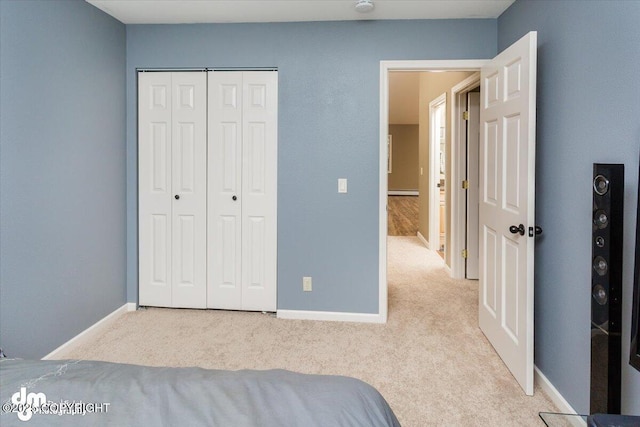 18644 Eaglewood Loop, Eagle River, AK 99577 - carpeted bedroom featuring a closet and baseboards