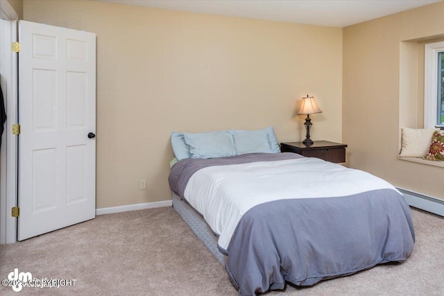 18644 Eaglewood Loop, Eagle River, AK 99577 - bedroom with carpet floors and a baseboard heating unit