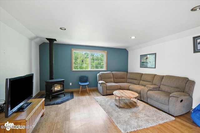 2436 N Hope Cir, Palmer, AK 99645 - living area featuring a wood stove, wood finished floors, and recessed lighting