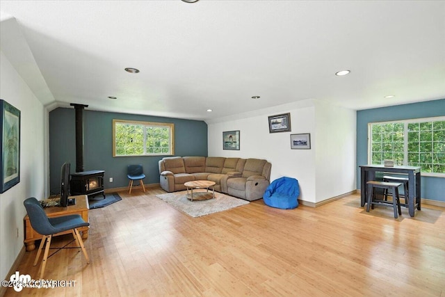 2436 N Hope Cir, Palmer, AK 99645 - living room with a wood stove, wood finished floors, plenty of natural light, and recessed lighting