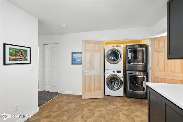 2436 N Hope Cir, Palmer, AK 99645 - laundry room with stacked washer / drying machine and baseboards