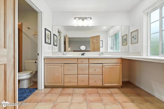 2436 N Hope Cir, Palmer, AK 99645 - bathroom featuring double vanity, plenty of natural light, and tile patterned floors