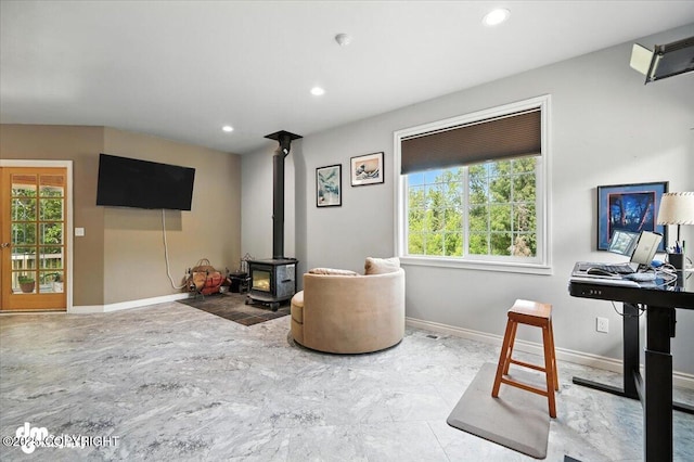 2436 N Hope Cir, Palmer, AK 99645 - living area featuring a wood stove and recessed lighting