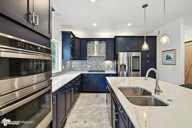 2436 N Hope Cir, Palmer, AK 99645 - kitchen with stainless steel appliances, wall chimney exhaust hood, tasteful backsplash, light stone counters, and recessed lighting