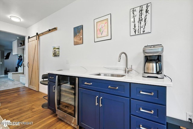 2436 N Hope Cir, Palmer, AK 99645 - bar area with wine cooler, dark wood finished floors, and a barn door