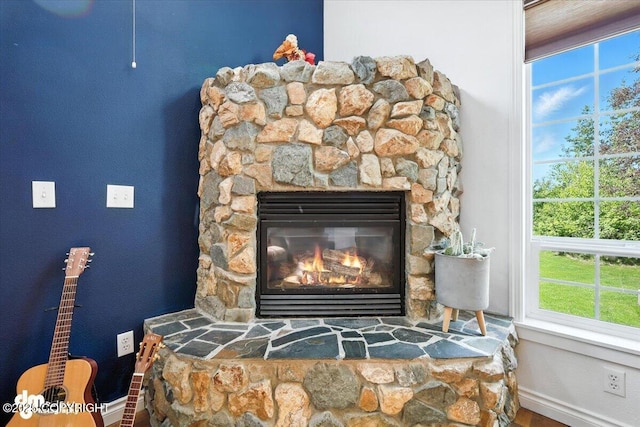 2436 N Hope Cir, Palmer, AK 99645 - detailed view of baseboards and a stone fireplace