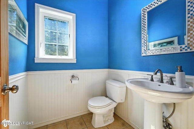 2436 N Hope Cir, Palmer, AK 99645 - half bathroom featuring wainscoting and tile patterned floors