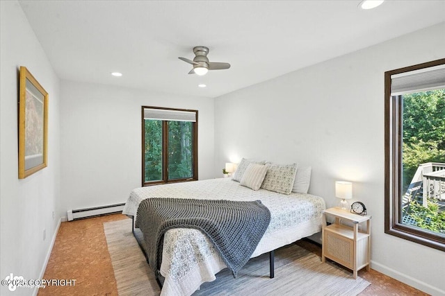 2634 Forest Park Dr # 114, Anchorage, AK 99517 - bedroom with a baseboard radiator, recessed lighting, and a ceiling fan