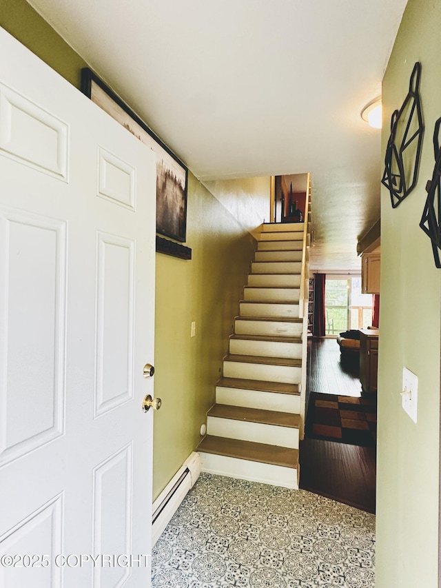 2703 David St, Juneau, AK 99801 - staircase featuring a baseboard radiator and baseboards