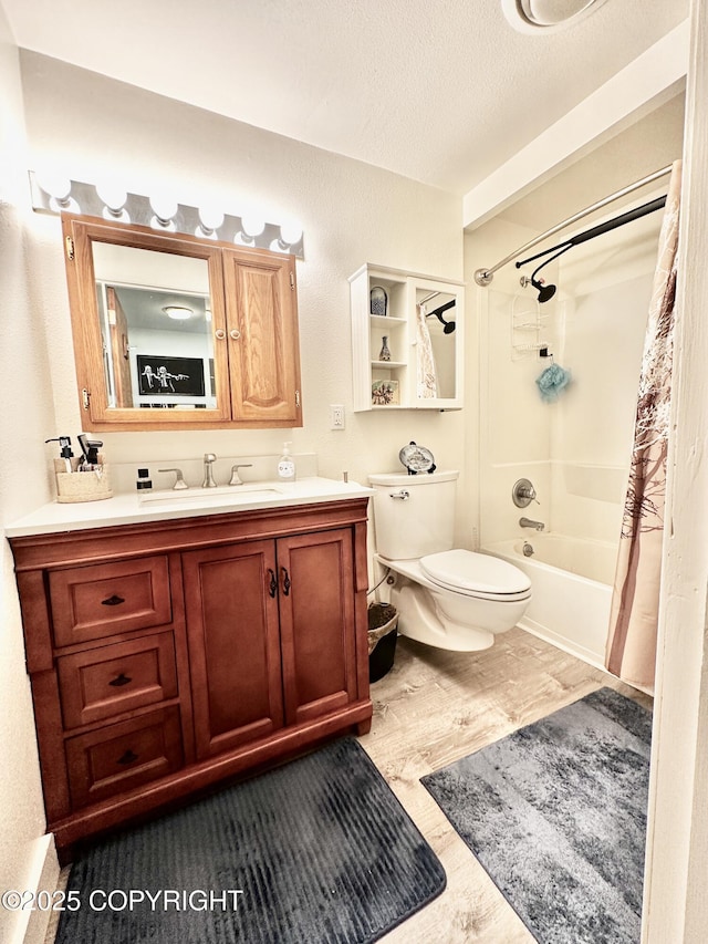 2703 David St, Juneau, AK 99801 - full bath featuring vanity, shower / bath combo, wood finished floors, and a textured ceiling