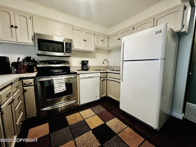 2703 David St, Juneau, AK 99801 - kitchen featuring stainless steel appliances, light countertops, and dark wood finished floors