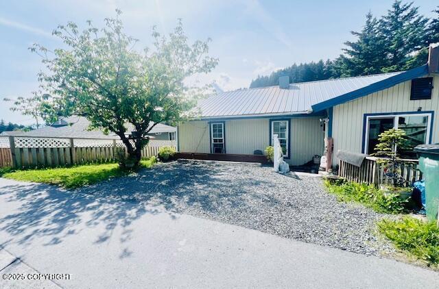 515 Maple Ave, Kodiak, AK 99615 - ranch-style home featuring a chimney
