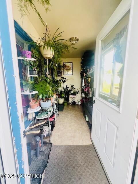 515 Maple Ave, Kodiak, AK 99615 - doorway to outside featuring tile patterned floors