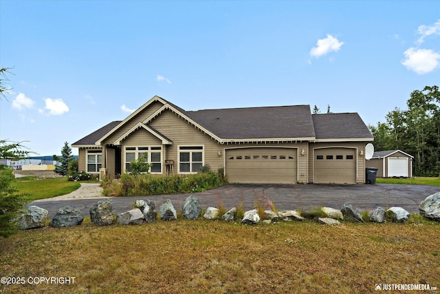 3827 E Country Field Cir, Wasilla, AK 99654 - view of front of property featuring a garage, a front lawn, and asphalt driveway