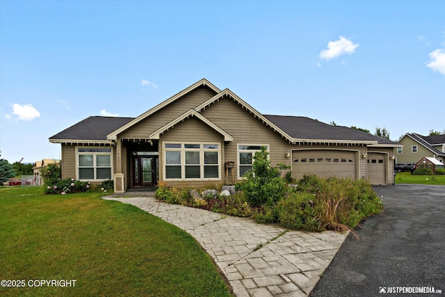 3827 E Country Field Cir, Wasilla, AK 99654 - view of front facade with an attached garage, driveway, and a front lawn