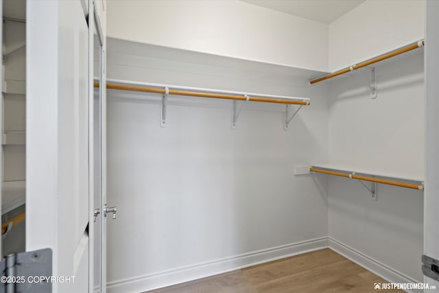 3827 E Country Field Cir, Wasilla, AK 99654 - spacious closet with wood finished floors