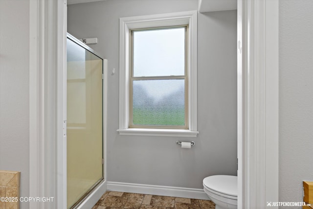 3827 E Country Field Cir, Wasilla, AK 99654 - bathroom featuring a shower stall and stone finish floors