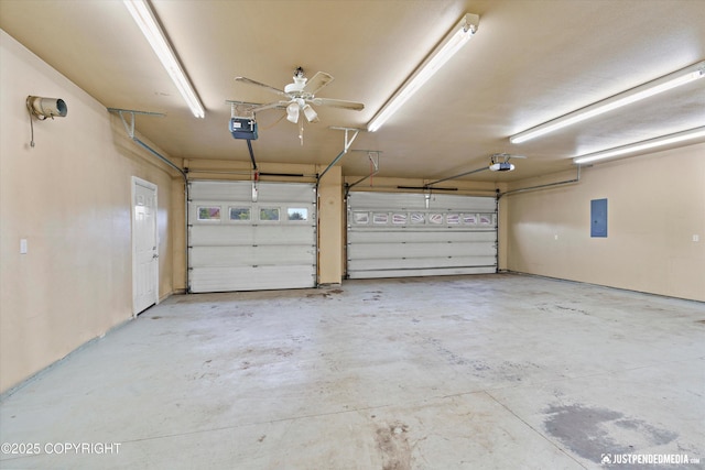 3827 E Country Field Cir, Wasilla, AK 99654 - garage with electric panel and a garage door opener