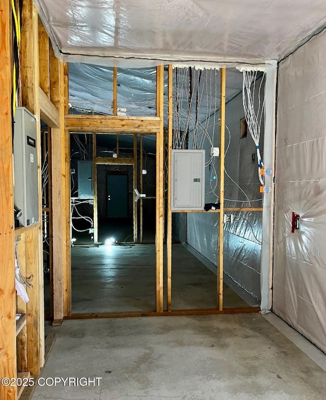 21635 Renault St, Kasilof, AK 99610 - miscellaneous room featuring electric panel and concrete floors