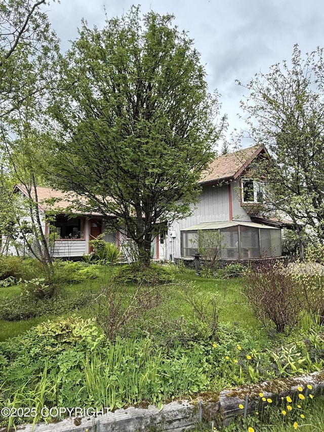 9238 Emily Way, Juneau, AK 99801 - view of front facade featuring a sunroom