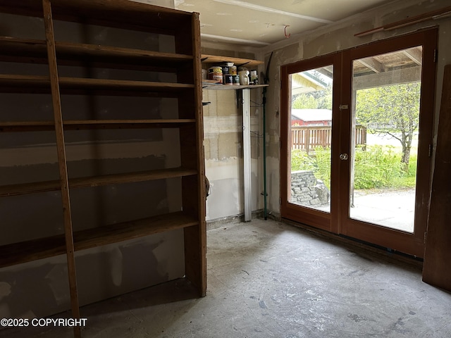9238 Emily Way, Juneau, AK 99801 - doorway to outside with concrete flooring and french doors