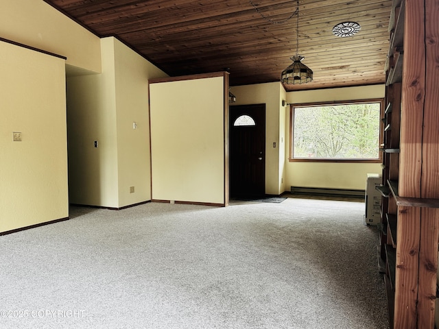9238 Emily Way, Juneau, AK 99801 - unfurnished living room with wood ceiling, light colored carpet, and baseboard heating