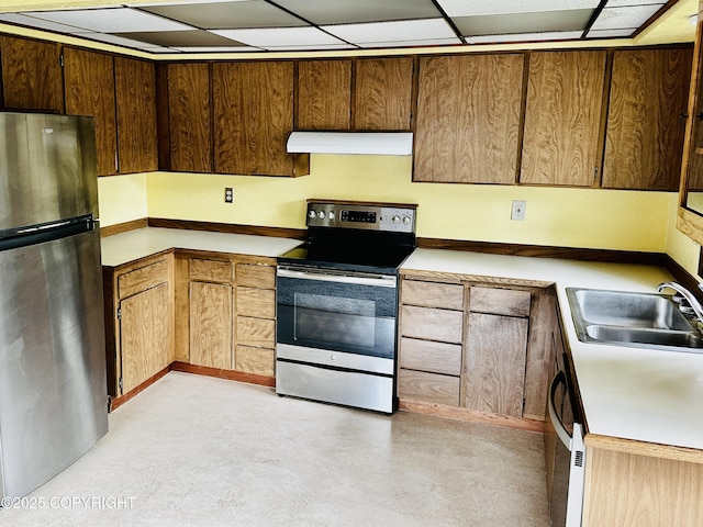 9238 Emily Way, Juneau, AK 99801 - kitchen featuring stainless steel appliances, premium range hood, concrete flooring, and light countertops