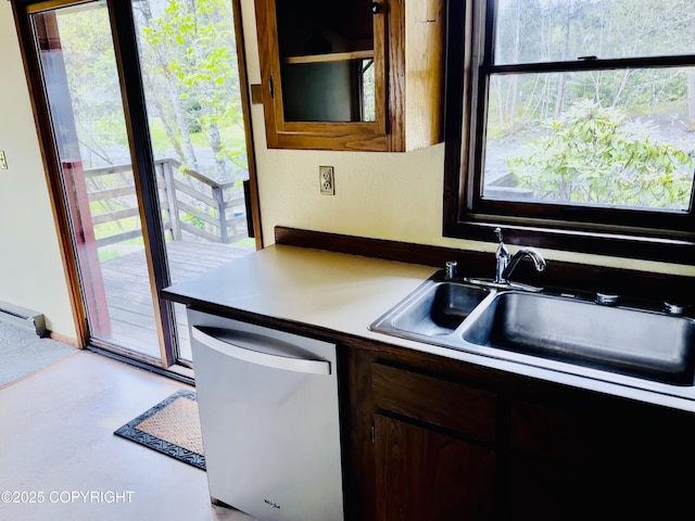 9238 Emily Way, Juneau, AK 99801 - kitchen with dishwasher and a baseboard heating unit
