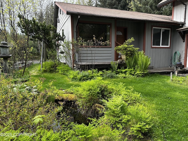 9238 Emily Way, Juneau, AK 99801 - view of side of home with roof with shingles