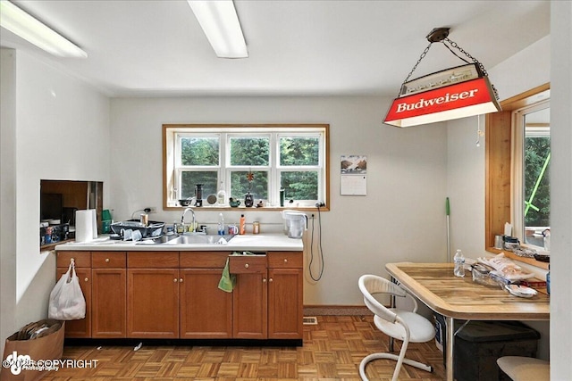63735 Caribou Ln, Hope, AK 99605 - kitchen with brown cabinets and light countertops