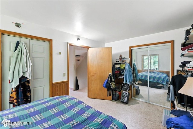 63735 Caribou Ln, Hope, AK 99605 - bedroom featuring a closet, a wainscoted wall, and carpet floors
