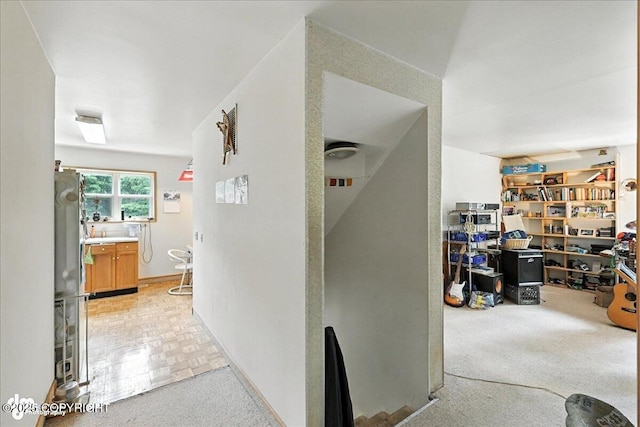 63735 Caribou Ln, Hope, AK 99605 - hallway with light carpet