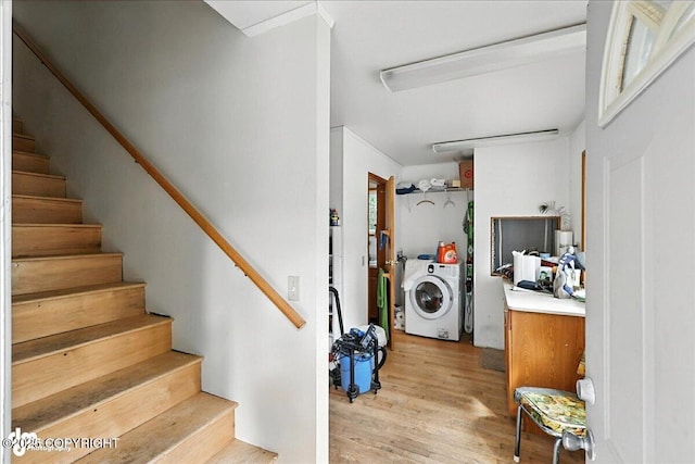 63735 Caribou Ln, Hope, AK 99605 - stairs with washer / dryer and wood finished floors