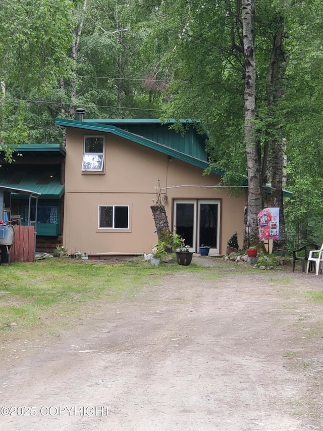 22120 S Easy St, Talkeetna, AK 99676 - back of property with stucco siding