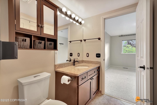 7612 Lumbis Ave # 4, Anchorage, AK 99518 - bathroom with vanity and toilet