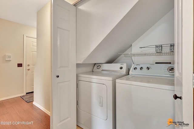 7612 Lumbis Ave # 4, Anchorage, AK 99518 - laundry room with washing machine and dryer and light wood-type flooring