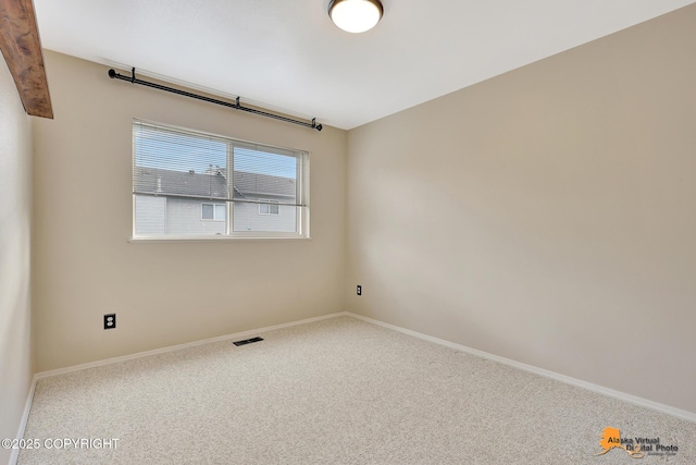7612 Lumbis Ave # 4, Anchorage, AK 99518 - carpeted empty room with baseboards