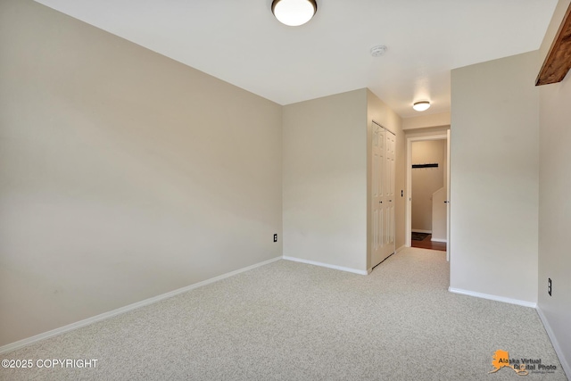 7612 Lumbis Ave # 4, Anchorage, AK 99518 - unfurnished room with carpet floors and a smoke detector