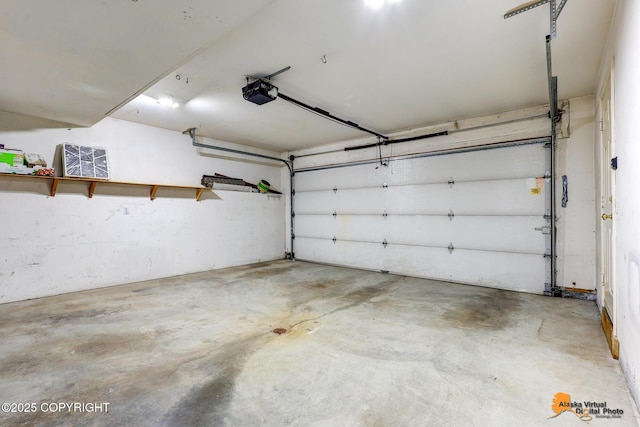 7612 Lumbis Ave # 4, Anchorage, AK 99518 - garage with a garage door opener