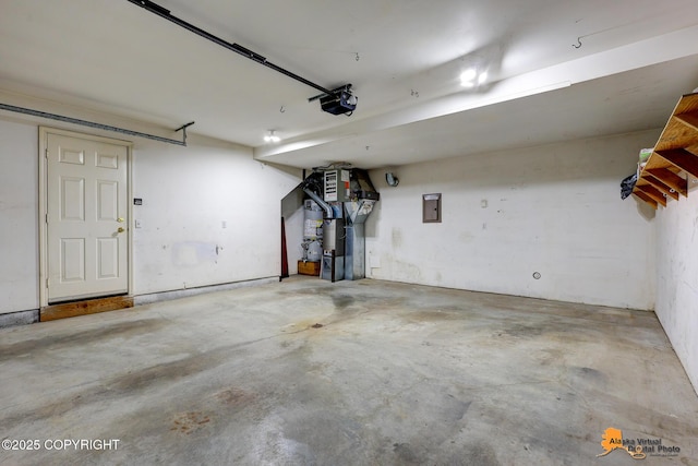 7612 Lumbis Ave # 4, Anchorage, AK 99518 - garage with a garage door opener and electric panel