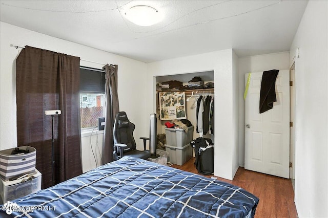 330 N Bliss St, Anchorage, AK 99508 - bedroom featuring wood finished floors and a closet