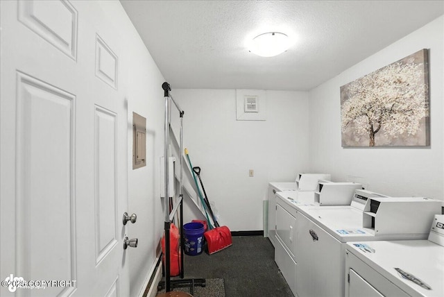 330 N Bliss St, Anchorage, AK 99508 - communal laundry room with washer and clothes dryer and a textured ceiling